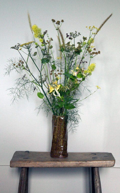 A posy containing bronze fennel, Bupleurum falcatum, Bupleurum longifolium 'Bronze Beauty', Lonicera periclymenum 'Graham Thomas', Thalictrum flavum ssp. glaucum & Hordeum bulbosum