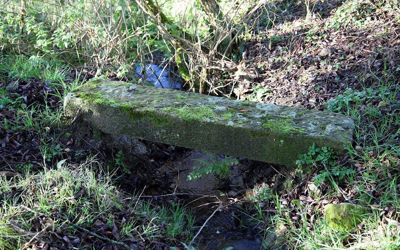 A stone sleeper bridge on Dan Pearson's Somerset property. Photo: Huw Morgan