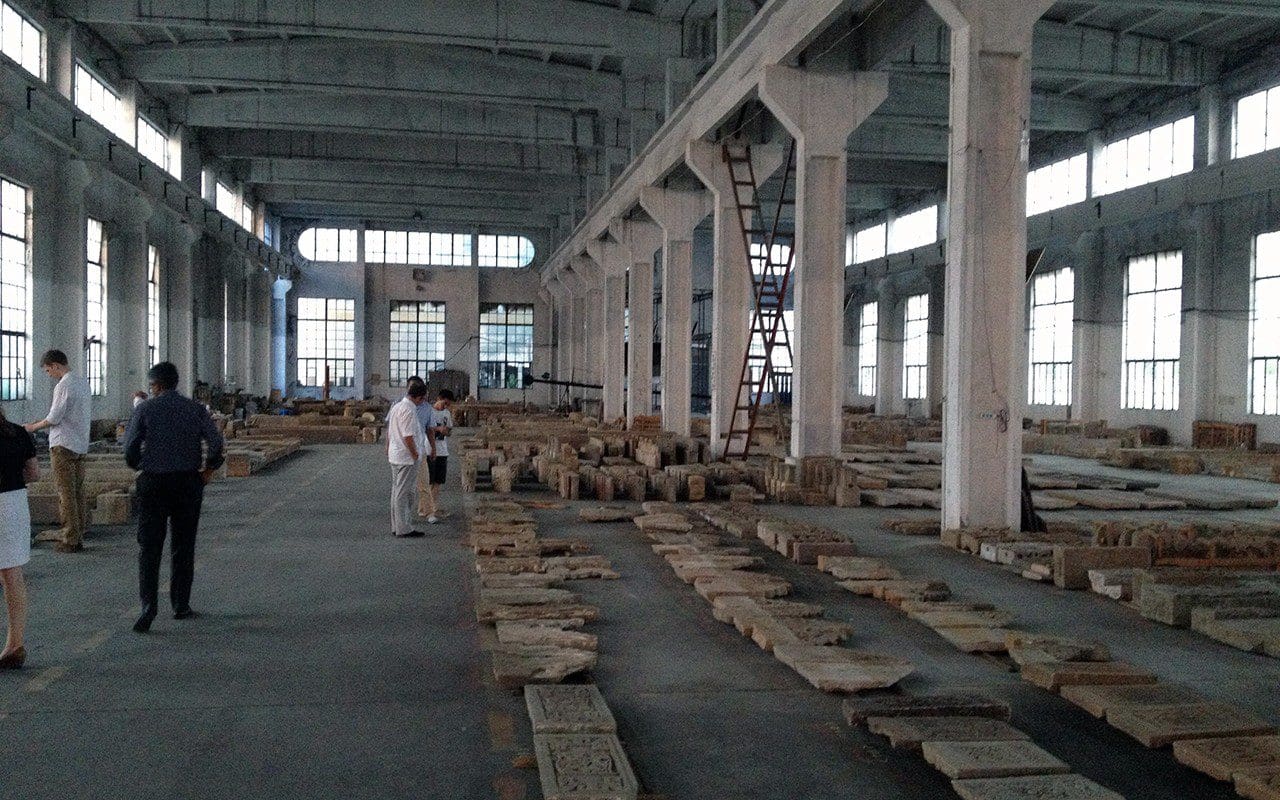 A warehouse containing disassembled Ming dynasty merchants' houses used in the Amanyangyun resort  